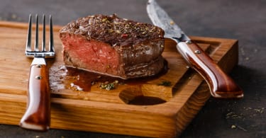 Filet Mignon Steak on wooden board