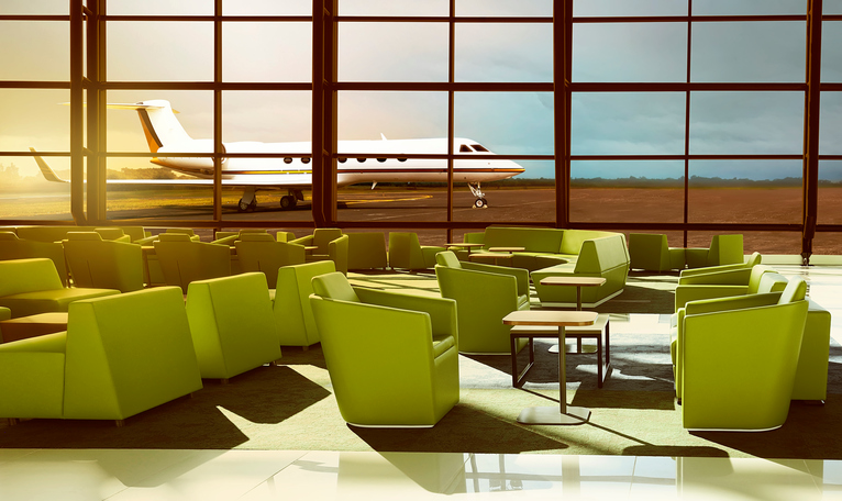 Green sofa on the luxury airport lobby