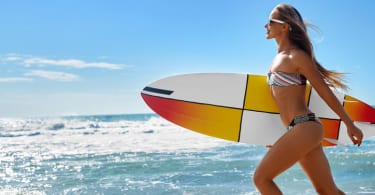 Extreme Water Sport. Surfing. Girl With Surfboard Beach Running.