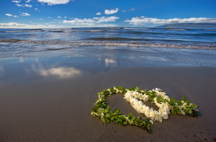 Heart shaped flower lei and garland on beach