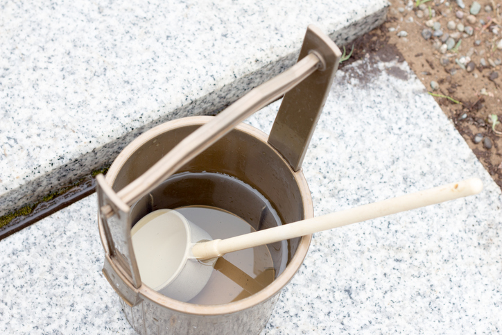 Japanese ablutionary bucket and ladle in grave yard